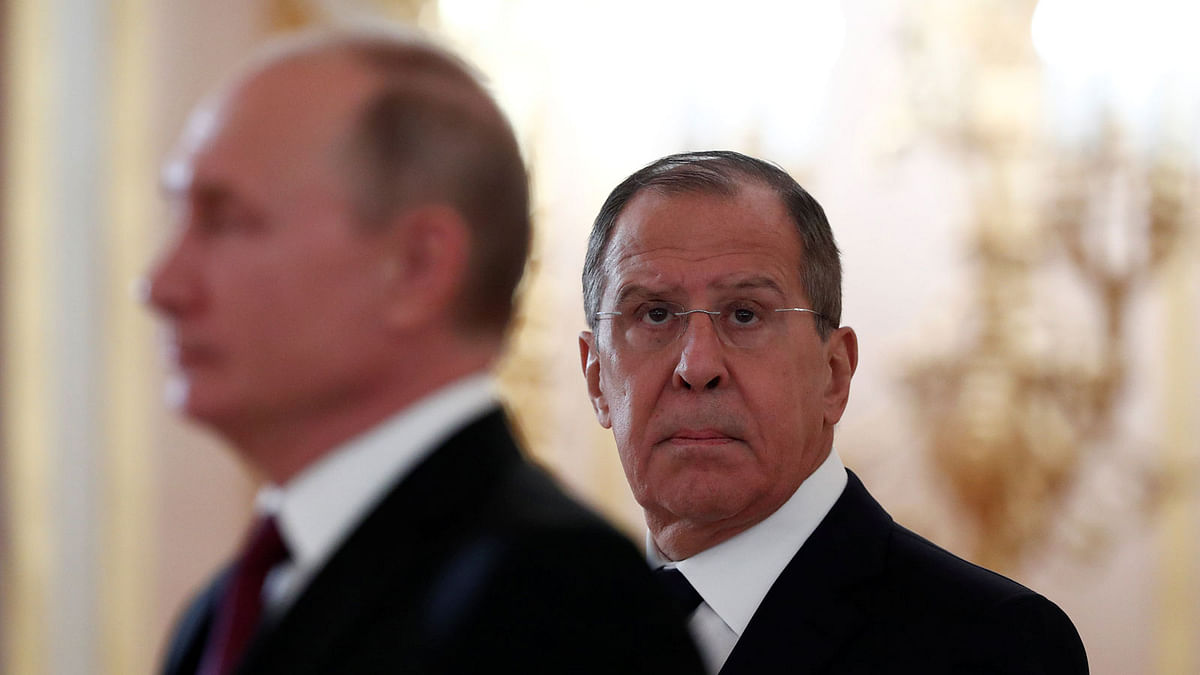 Russian president Vladimir Putin (L) and foreign minister Sergei Lavrov attend a ceremony to receive diplomatic credentials from newly appointed foreign ambassadors at the Kremlin in Moscow, Russia on 11 October. Photo: Reuters