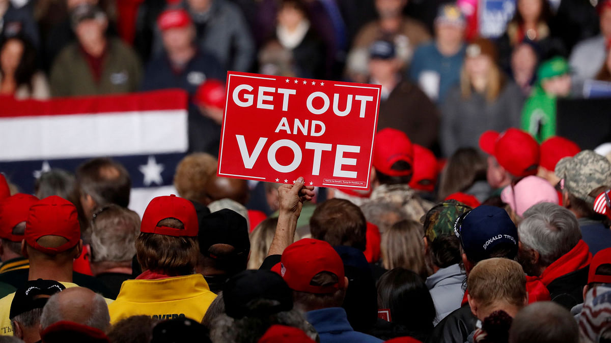 Supporters participate at a campaign rally in Mosinee, Wisconsin, US, 24 October 2018. Photo: Reuters
