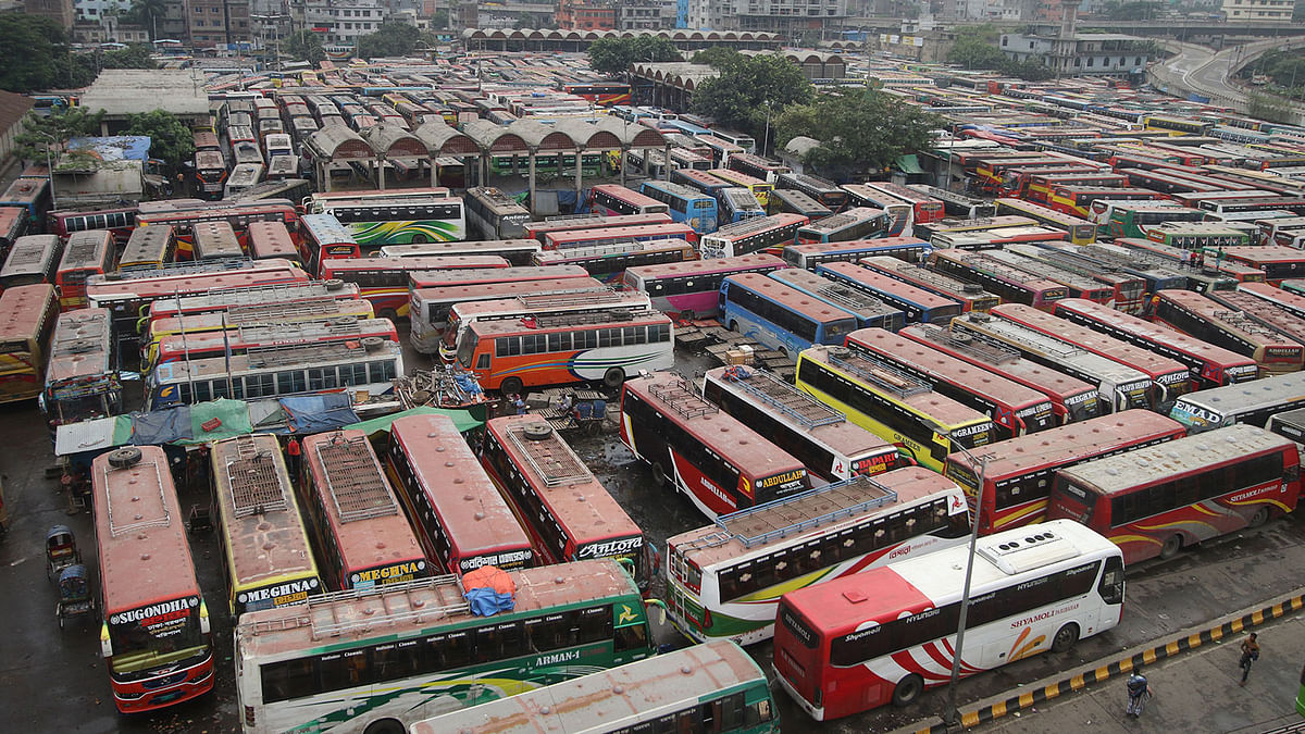 Buses queued up at the Sayedabad bus terminal, Dhaka during the 48-hour country-wide transport strike called by the transport workers on Sunday. 28 October, Dhaka. Photo: Abdus Salam