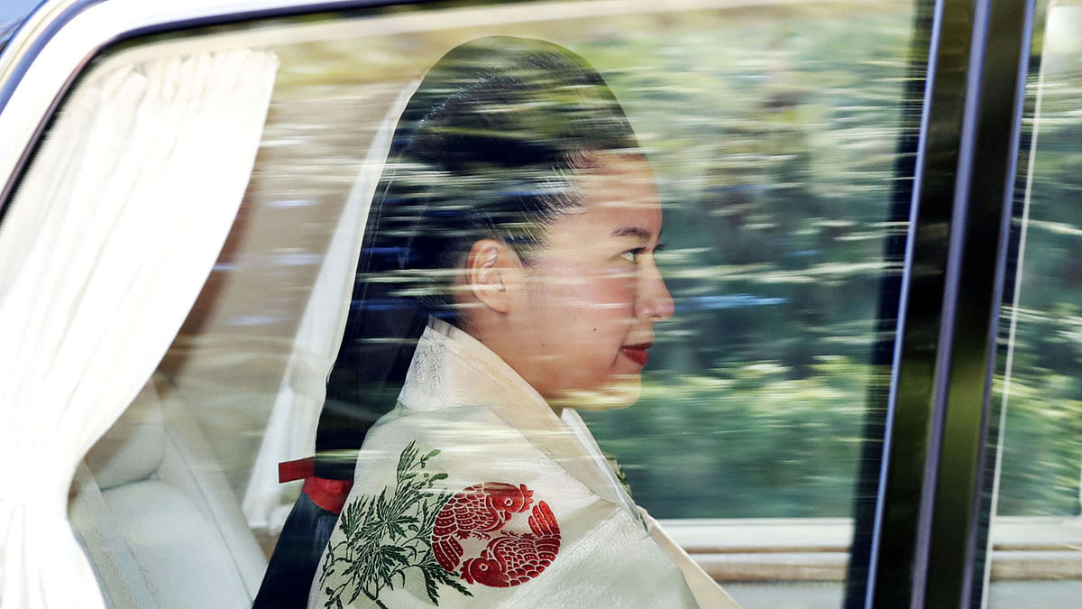Japanese Princess Ayako in a car heads to her wedding ceremony in Tokyo, Japan, in this photo taken on 29 October 29, 2018. Photo: Reuters