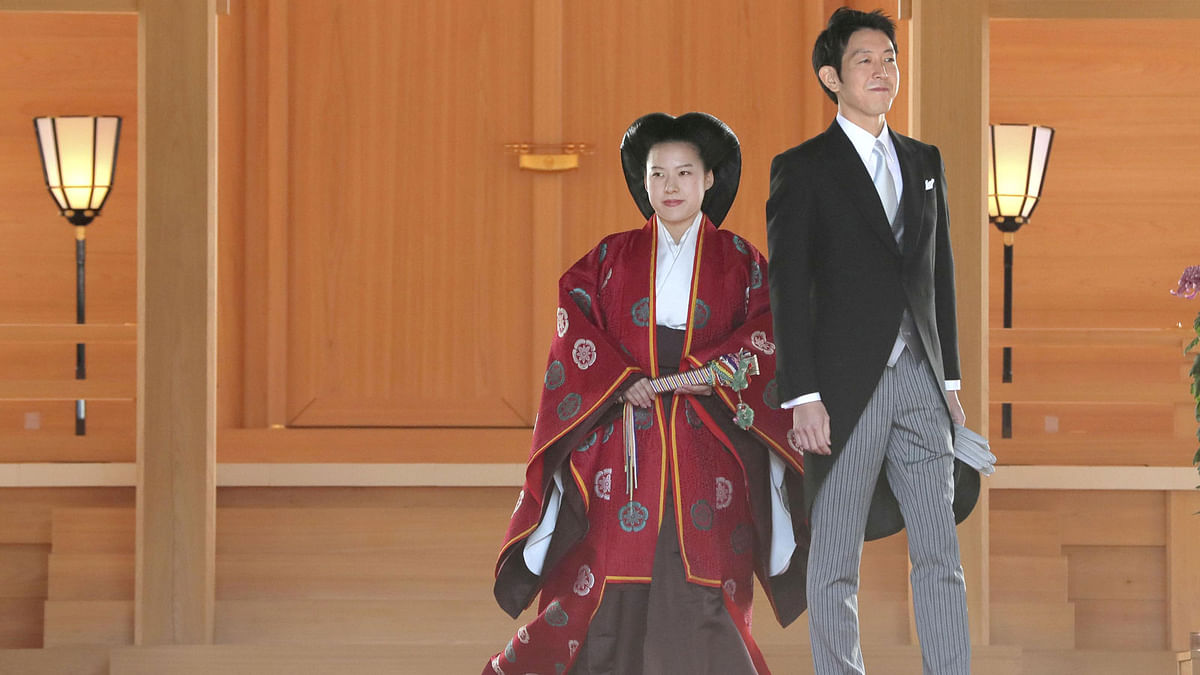Japanese Princess Ayako (L) and her husband Kei Moriya are pictured after their wedding ceremony at the Meiji Shrine in Tokyo, Japan on 29 October 2018. Photo: Reuters