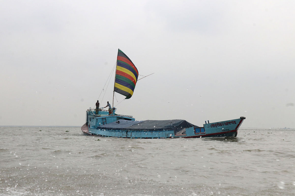 A boat sails on Padma river in Kazirhat area of Bera upazila in Pabna. Hasan Mahmud took this photo on 1 November.