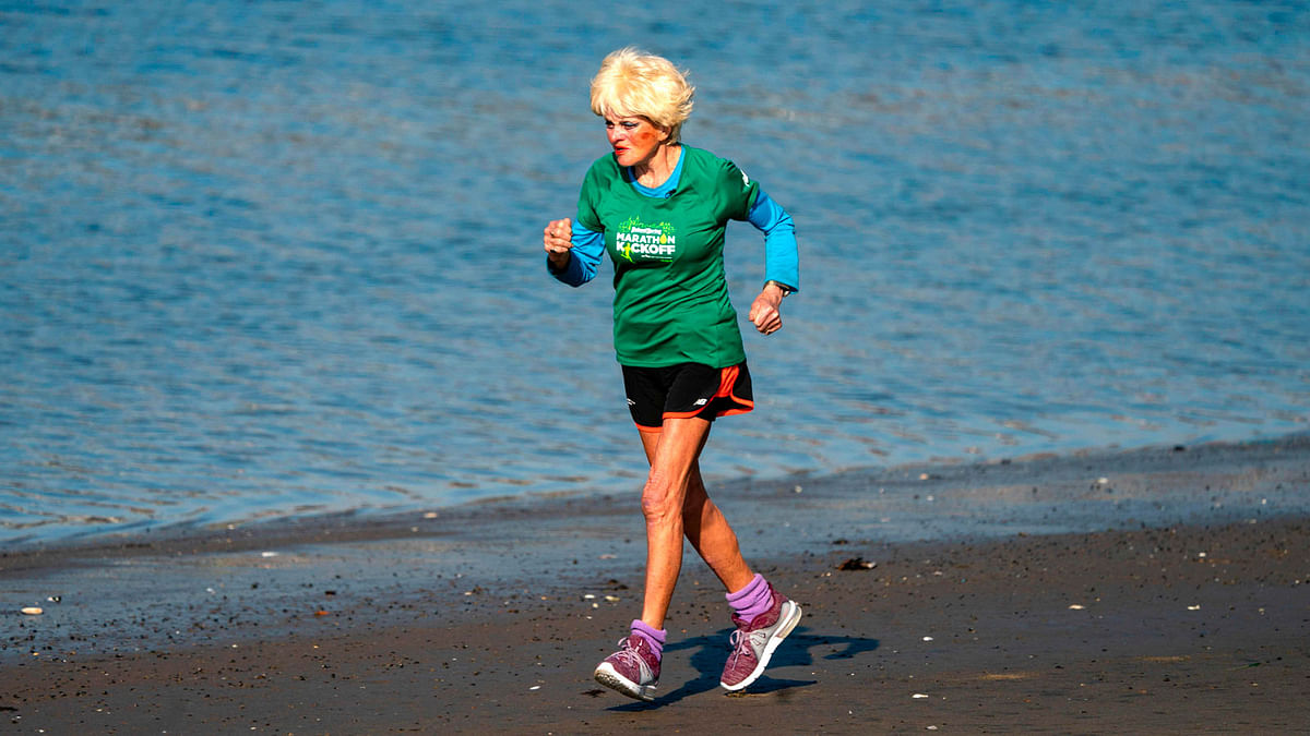 French marathoner Ginette Bedard, 85, runs near her home in the Queens Borough of New York on 1 November 2018. Photo: AFP