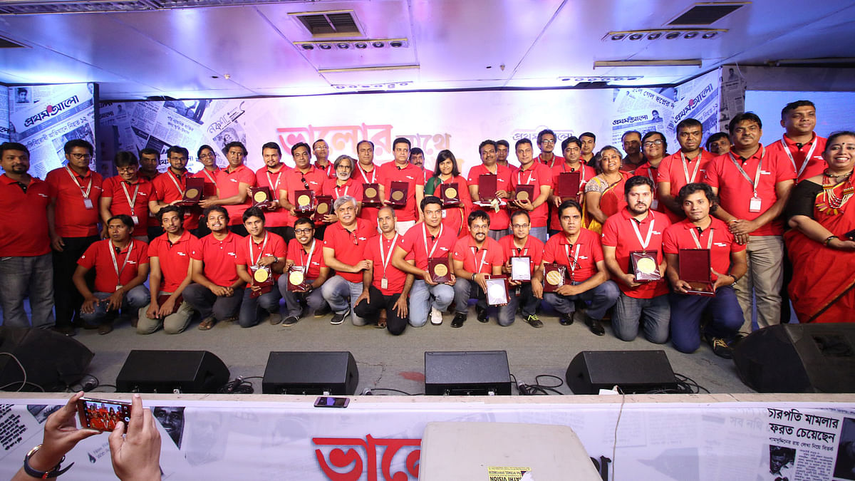 Awardees pose for photographs. Photo: Prothom Alo.