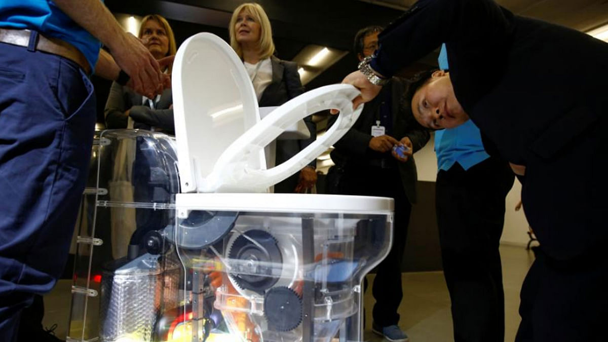 A man looks at a toilet design by Cranfield University at the Reinvented Toilet Expo showcasing sewerless sanitation technology in Beijing, China on 6 November 2018.—Photo: Reuters