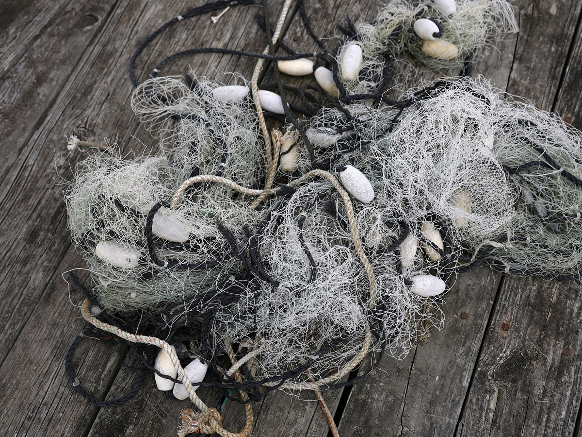 Fishing nets lie at a dock in Wanchese, North Carolina, US on 30 May 2017. Photo: Reuters