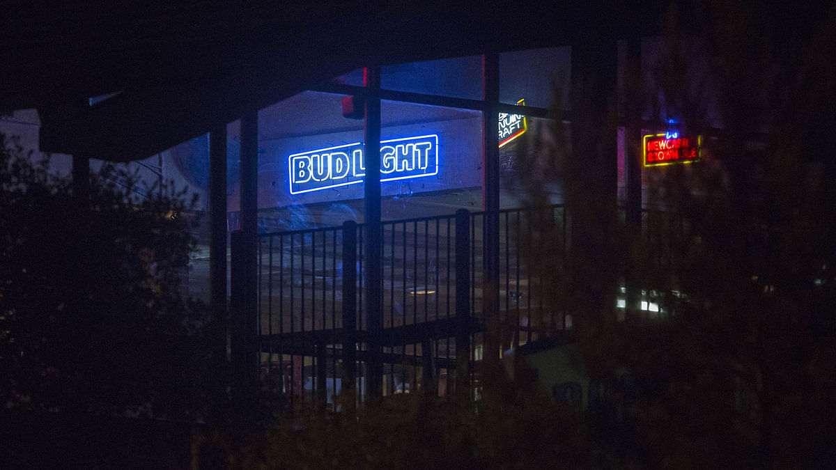 Neon signs are on display at The Borderline Bar and Grill, the scene of a mass shooting, is seen on 8 November, 2018 in Thousand Oaks, California. Photo: AFP