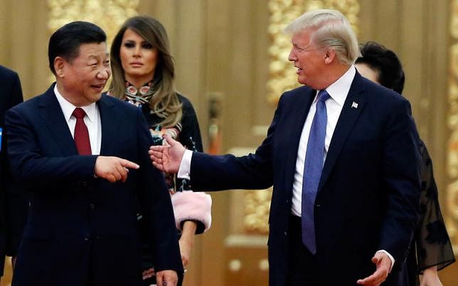 In this 9 November, 2017, file photo, US president Donald Trump China`s president Xi Jinping arrive for the state dinner with the first ladies at the Great Hall of the People in Beijing, China. AP File Photo