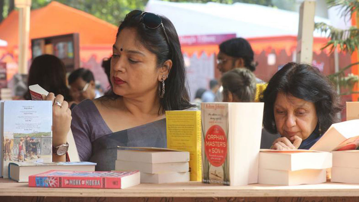 Visitors browse books at the stalls of Dhaka Lit Fest on Bangla Academy premises in Dhaka city on 8 November. Photo: Abdus Salam