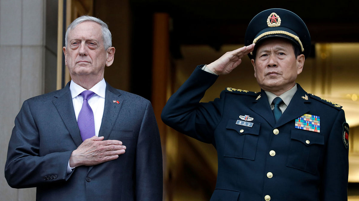 US Defence Secretary James Mattis (L) welcomes Chinese Minister of National Defence General Wei Fenghe to the Pentagon in Arlington, Virginia, US, on 9 November 2018. Photo: Reuters