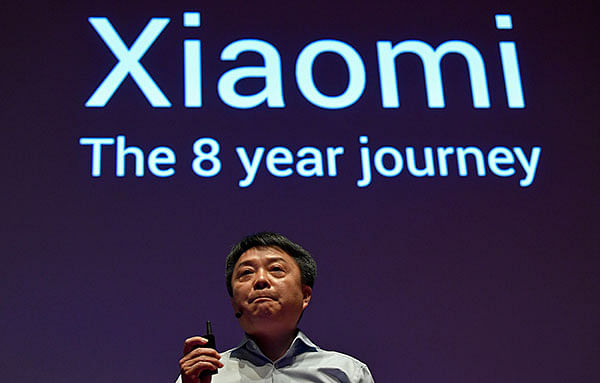 Senior vice president of Xiaomi, Xiang Wang, speaks at a UK launch event in London