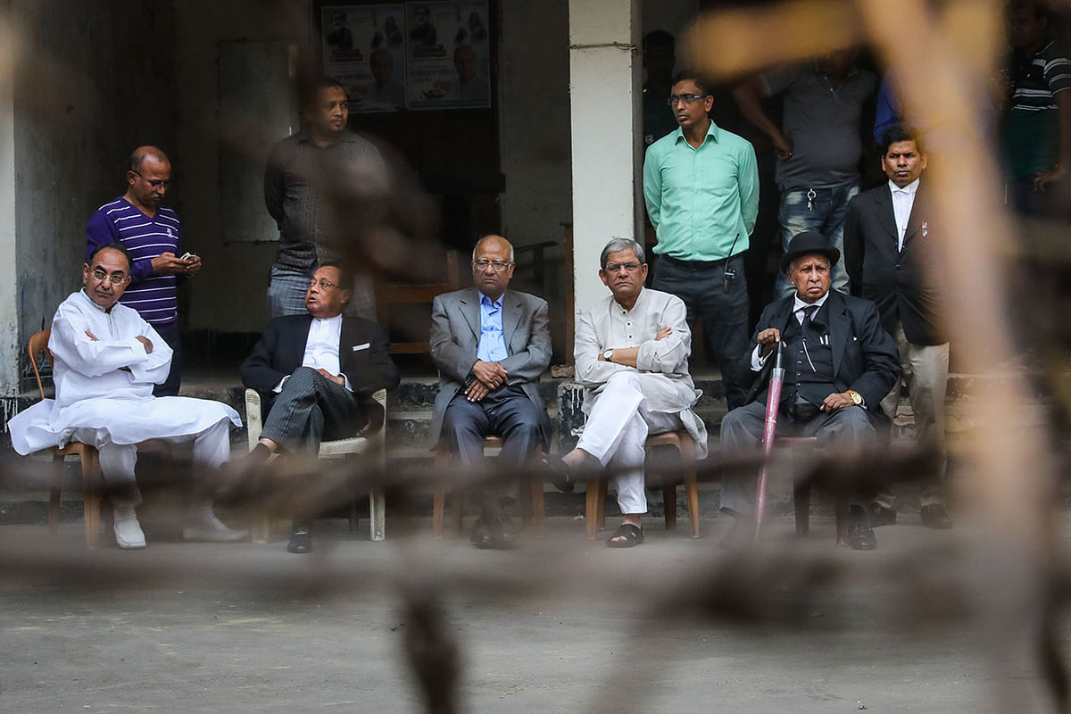 Five of the Bangladesh Nationalist Party leaders waiting before the prison gate at Nazimuddin Road, Dhaka on 12 November. Photo: Dipu Malakar