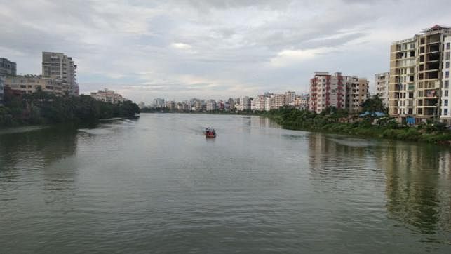 A boat sails in Hatirjheel. The only navigable canal in the city. Photo: Toriqul Islam