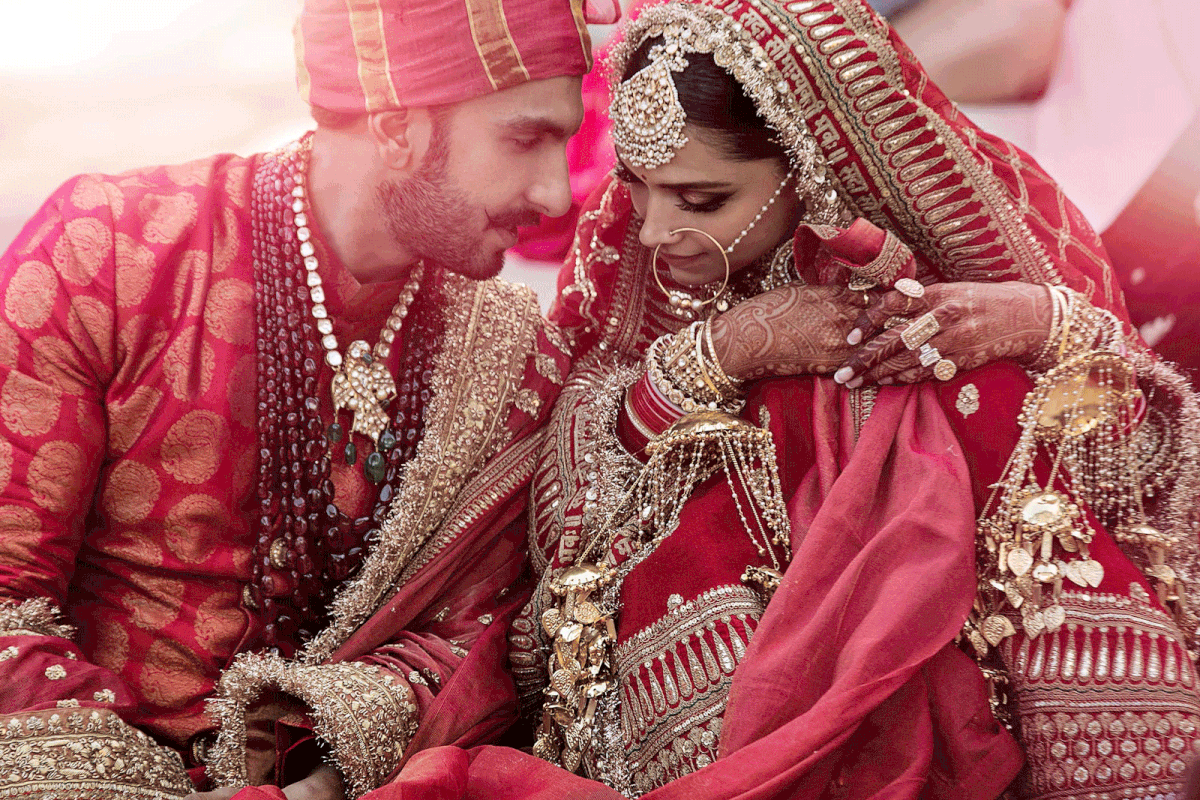 In this handout picture taken on 15 November, 2018 and released by Yash Raj Films, Bollywood actors Deepika Padukone (R) and Ranveer Singh celebrate their wedding in Lake Como, in the northern Italy’s Lombardy region. Bollywood superstars Deepika Padukone and Ranveer Singh have tied the knot in Italy. Photo: AFP