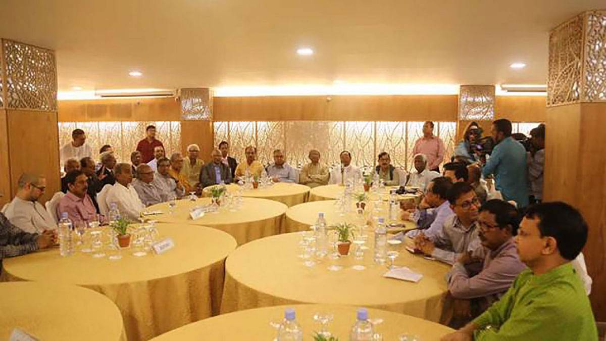 Jatiya Oikya Front leaders while exchanging views with the editors of print media in a city hotel on Friday. Photo: UNB