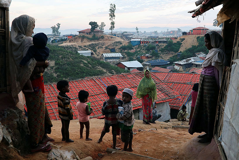 Rohingya refugee women and children look on at the Balukhali camp in Cox`s Bazar, Bangladesh on 15 November. Photo: Reuters