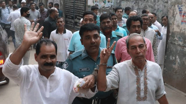 Police Thursday produce a number of BNP leaders and activists before CMM Court in three cases filed on charges of vandalism, arson attack and obstructing police from discharging their duties during violence in front of BNP`s Naya Paltan central office. Photo: Dipu Malakar