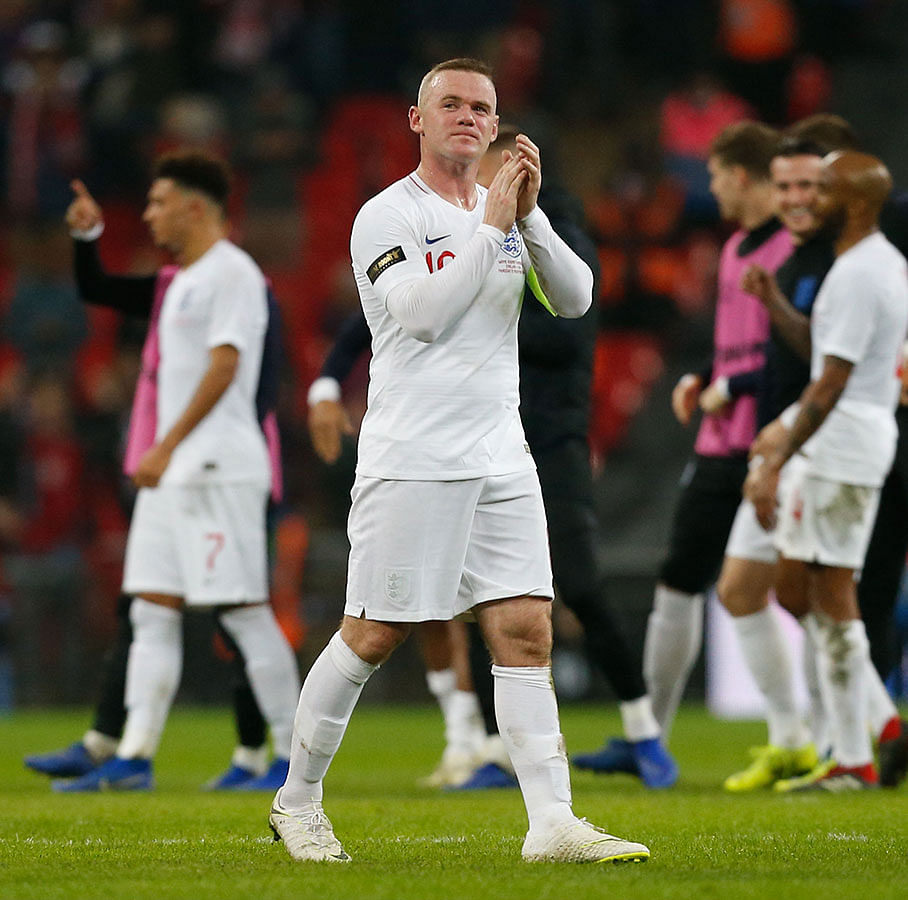 England`s striker Wayne Rooney applauds after the final whistle during the international friendly football match between England and the United States at Wembley stadium in north London on 15 November 2018. Photo: AFP