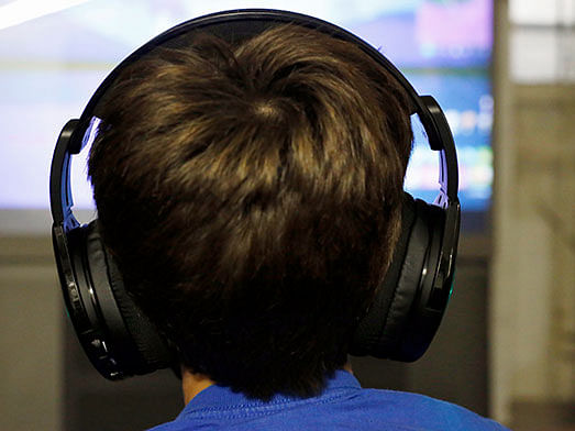 In this Saturday, 6 October 2018, photo Henry Hailey, 10, plays one of the online Fortnite game in the early morning hours in the basement of his Chicago home. His parents are on a quest to limit screen time for him and his brother. Photo: AP