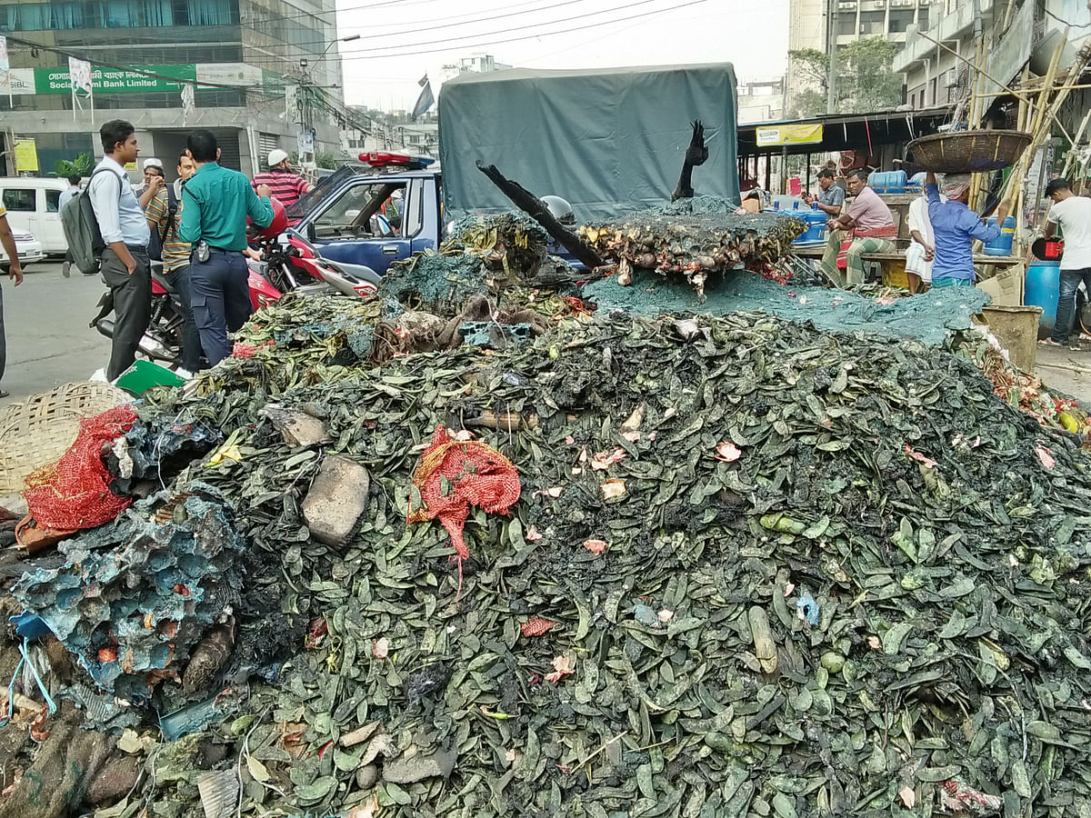 Pile of vegetable items burnt in the fire that caught the Karwan Bazar kitchen market in Dhaka on 21 November. Photo: Nusrat Nowrin