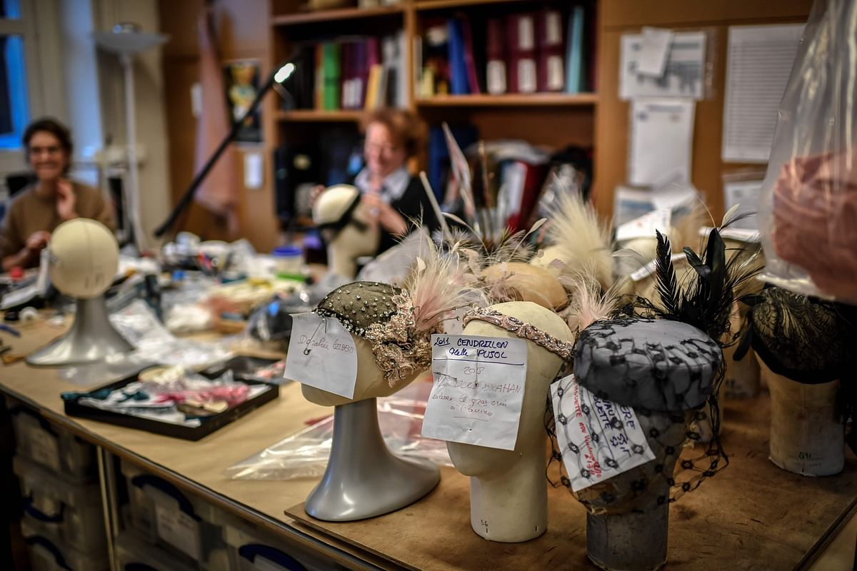 A picture taken on 6 November 2018 shows headdresses in the costume department at the Opera Garnier in Paris. An academy created in 2015 at the Paris Opera welcomes some 40 apprentices each year to learn the crafts of costume and wig making, tapistry, singing and music. Photo: AFP