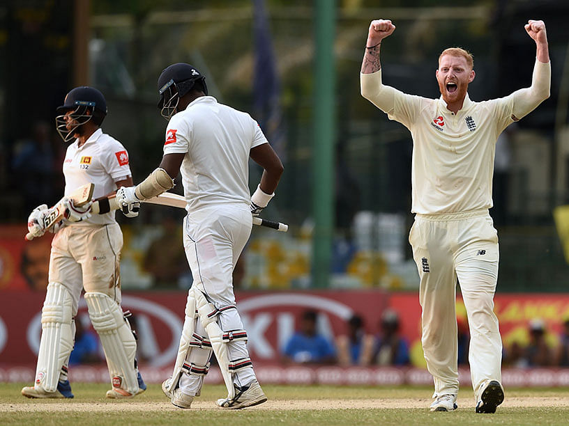 ngland`s Ben Stokes (R) celebrates after dismissing Sri Lanka`s Angelo Mathews (C) during the third day of the third Test match between Sri Lanka and England at the Sinhalese Sports Club (SSC) international cricket stadium in Colombo on 25 November 2018. Photo: AFP