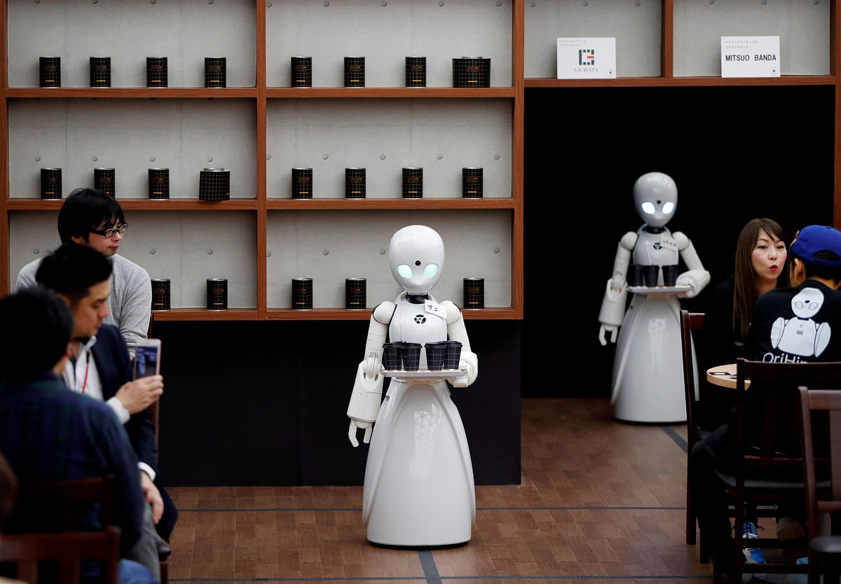 Remotely controlled robots OriHime-D, developed by Ory Lab to promote employment of disabled people, serve customers at a cafe in Tokyo, Japan on 26 November 2018. Photo: Reuters