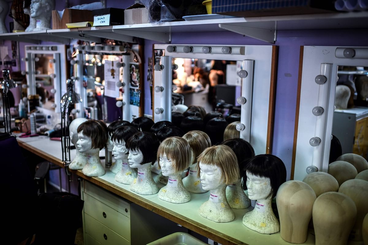 A picture taken on 6 November 2018 shows a view of the wig department at the Opera Bastille in Paris. An academy created in 2015 at the Paris Opera welcomes some 40 apprentices each year to learn the crafts of costume and wig making, tapestry, singing and music. Photo: AFP