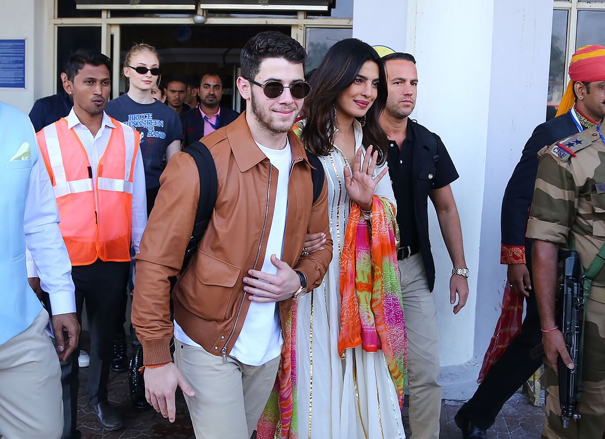 ndian actress Priyanka Chopra (centre R) and US musician Nick Jonas (centre L) arrive in Jodhpur in the western Indian state of Rajasthan on 29 November 2018, as friend of the couple British actress and Game of Thrones star Sophie Turner (2nd L) walks behind them. Chopra and Jonas are set to be married in a series of ceremonies in Jodhpur. Photo: AFP