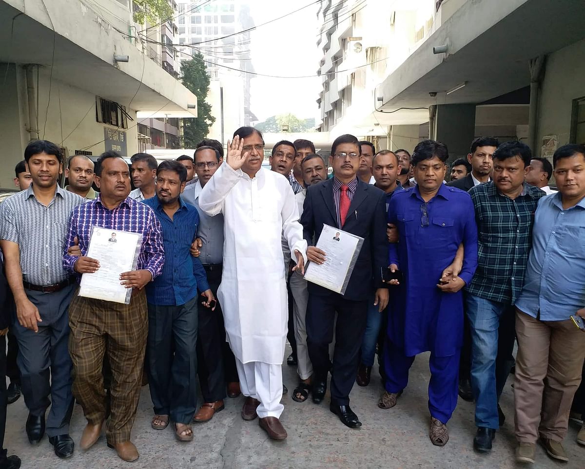 Abdus Salam, a leader of the Bangladesh Nationalist Party, submits his nomination paper to contest from Dhaka-13 constituency at the divisional commissioner`s office in Dhaka on 28 November. Photo: Mushtaq Ahmed