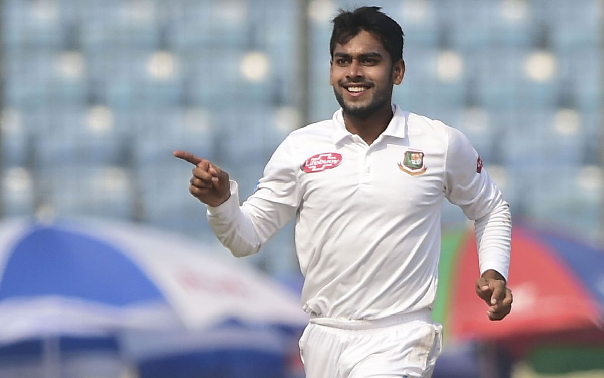 Bangladeshi cricketer Mehidy Hasan celebrates after the dismissal of the West Indies cricketer Kieran Powell during the third day of the second Test cricket match between Bangladesh and West Indies at the Sher-e-Bangla National Cricket Stadium in Dhaka on 2 December, 2018. Photo: AFP
