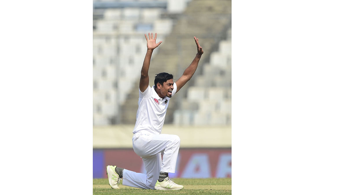Bangladeshi cricketer Taijul Islam appeals unsuccessfully for a leg before wicket (LBW) decision against West Indies cricketer Shimron Hetmyer during the third day of the second Test cricket at Dhaka on 2 December 2018. Photo: AFP