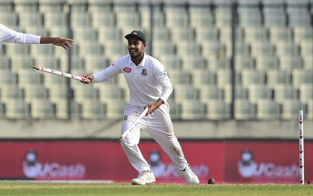 Mehidy Hasan celebrate their win at the end of the third day of the second Test cricket match between Bangladesh and West Indies at the Sher-e-Bangla National Cricket Stadium in Dhaka on 2 December, 2018. Photo: AFP