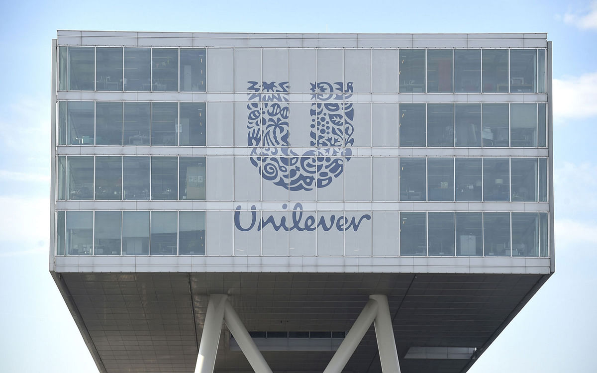 In this file photo taken on 05 June 2015 shows the logo of food company Unilever at the headquarters in Rotterdam. Anglo-Dutch food giant Unilever said on 3 December 2018 it is buying GlaxoSmithKline`s health drinks portfolio in Asia for a total of 3.3 billion euros ($3.7 billion), including iconic night-time hot drink Horlicks. -- Photo: AFP