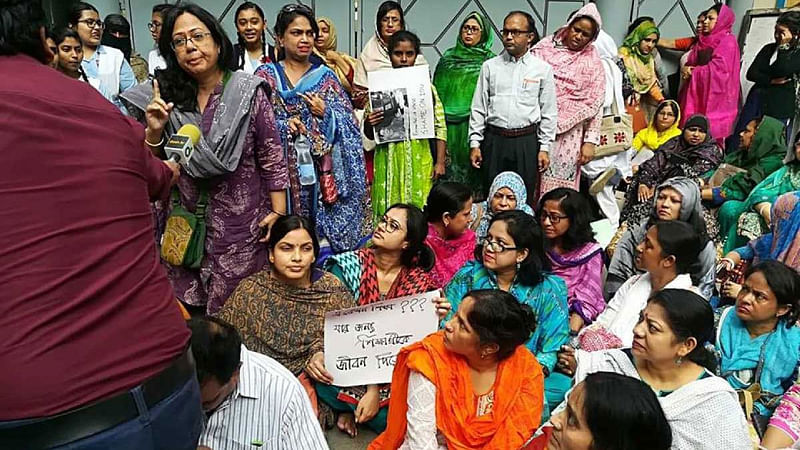 In this 4 December photo guardians of the students, who study at Viquarunnisa Noon School and College, are seen protesting in front of the school campus on Bailey Road against the suicide of a student on 3 December. Photo: UNB