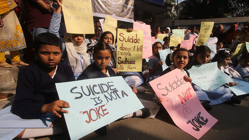 Students take position before the gate of the Viqarunnisa Noon School and College at Bailey Road in Dhaka on Wednesday demanding trial of the ‘instigated’ suicide of Aritree Adhikari. Photo: Abdus Salam