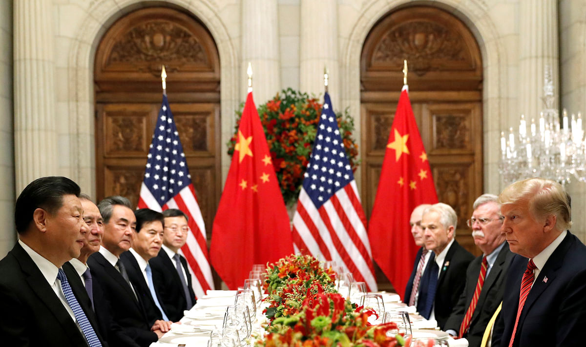 US president Donald Trump, US Secretary of State Mike Pompeo, US president Donald Trump`s national security adviser John Bolton and Chinese president Xi Jinping at a working dinner after the G20 leaders summit in Buenos Aires on 1 December 2018. Reuters File Photo