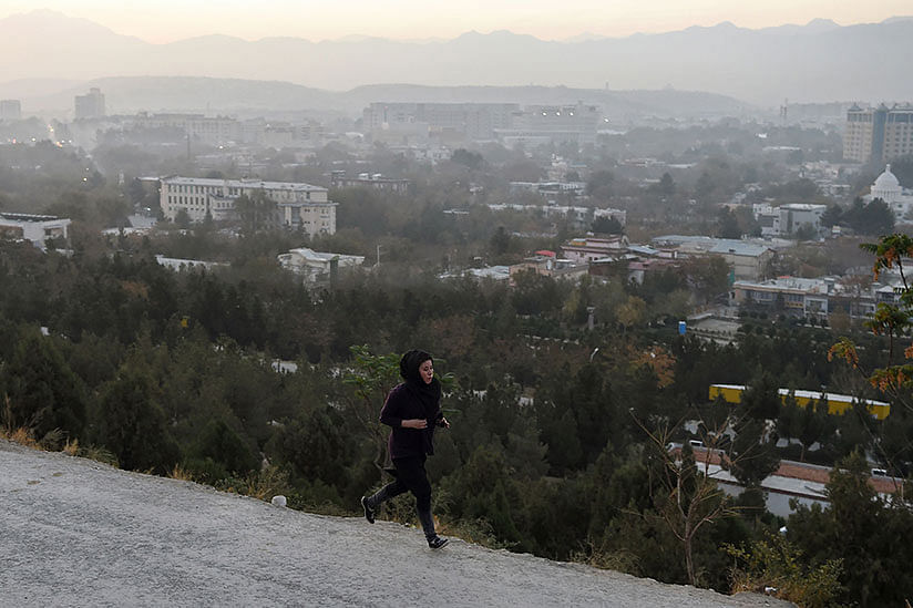 In this photo taken on 6 November 2018, an Afghan member of the all-female Free to Run group runs during a training session at the Wazir Akbar Khan hilltop overlooking Kabul. Photo: AFP
