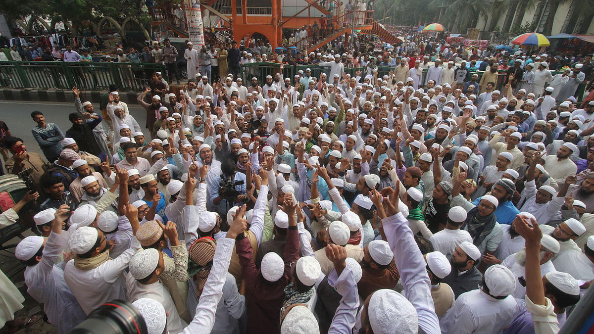 A section of anti-maulana Saad Kandhalvi Tabligh devotees hold rally before the Baitul Mukarrum National Mosque in the capital on 7 December. Earlier, clashes broke out between two sections of the Tabligh devotees for control over the Bishwa Ijtema in Tongi, Dhaka on 1 December leaving one dead and over 50 injured. Photo: Abdus Salam
