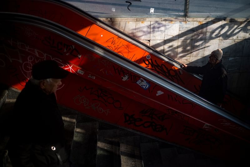 Two elderly men walk trough a passage in Belgrade on December 6, 2018. Massive emigration coupled with the plummeting birth rate, which at 1.5 children per family is among the lowest in Europe, has brought Serbia`s population down to under seven million people. According to UN, Serbia`s population is expected to shrink by 15 per cent by 2050. Photo: AFP