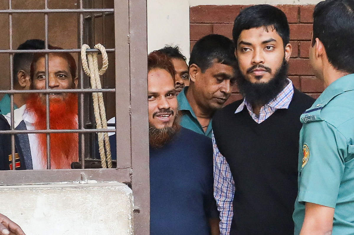A section of the six defendants among the eight named in the Holey Artisan attack case presented before the metropolitan session judge court in Dhaka on 9 December. Photo: Dipu Malakar