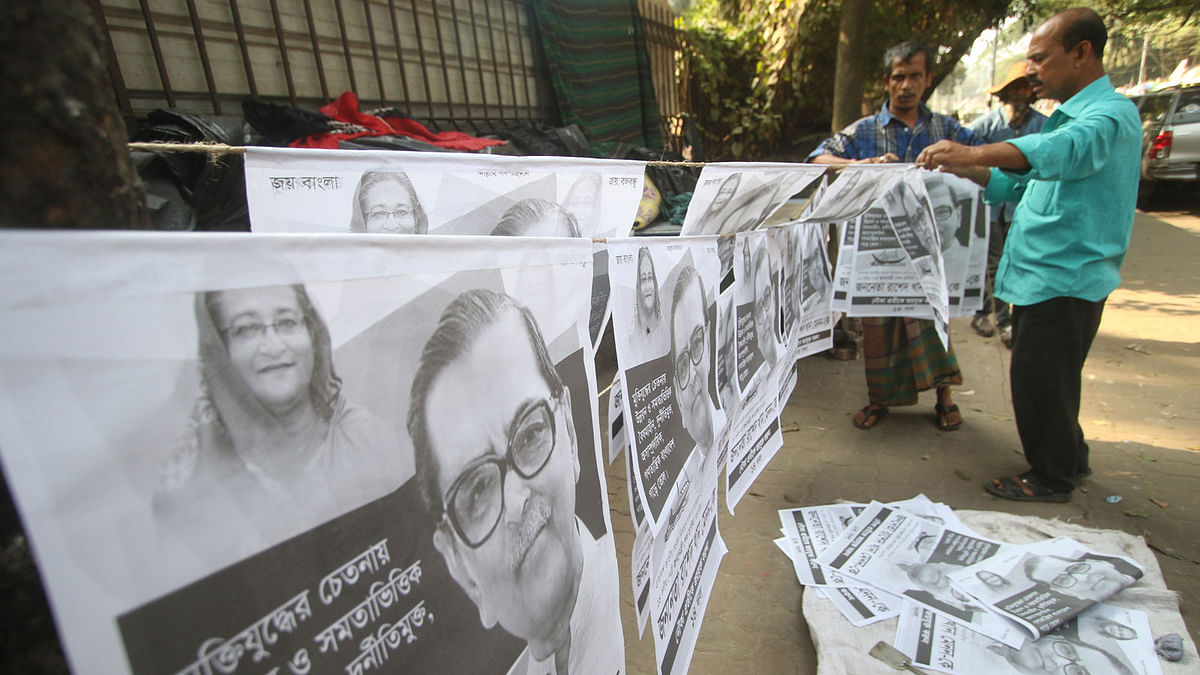 Posters drying as the election campaign is to begin soon at Curzon Hall in Dhaka University in the capital on 9 December. Photo: Abdus Salam
