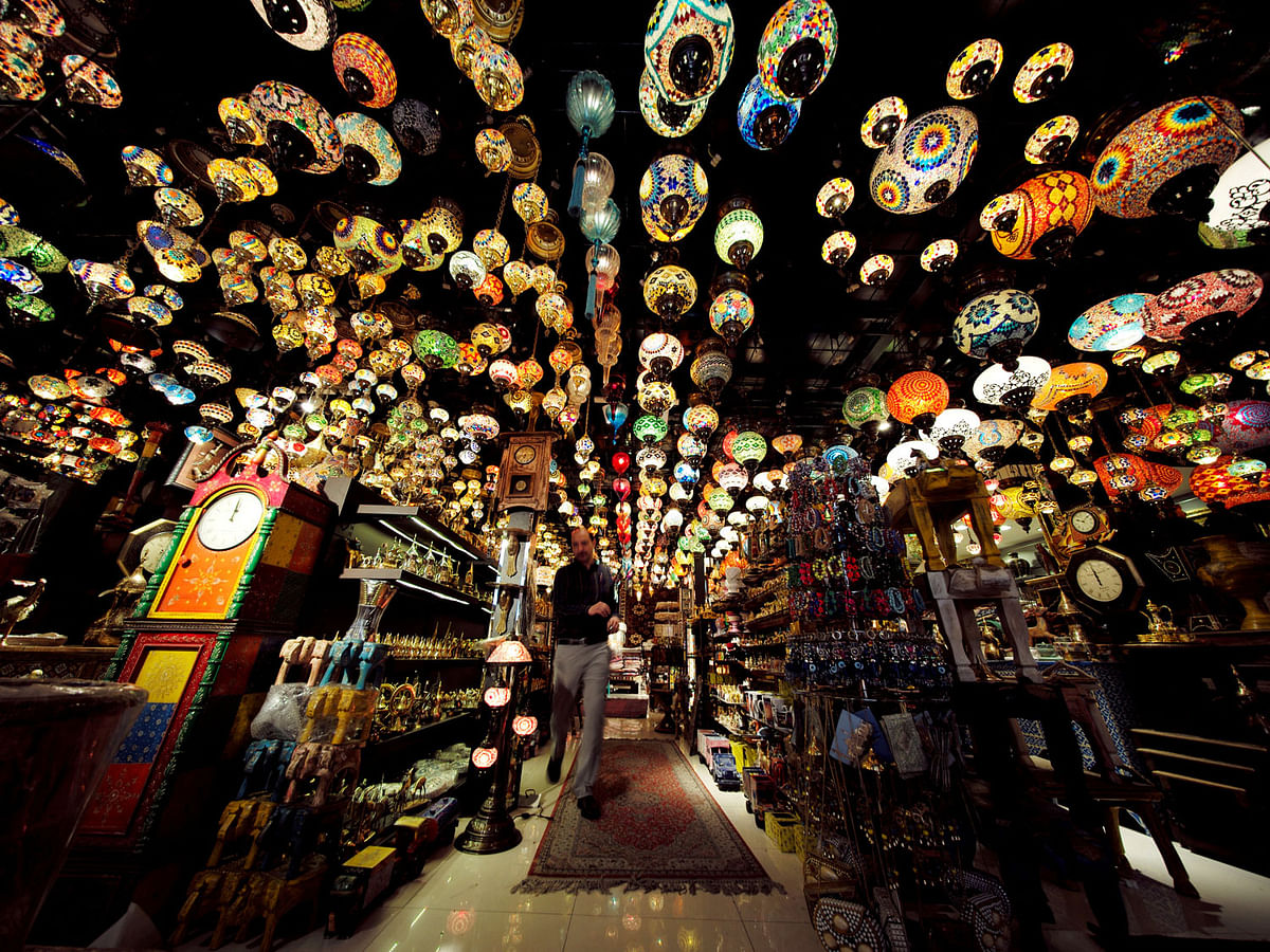 A visitor is seen walking in a traditional Arabic design lights shop in down town Manama, Bahrain, 10 December 2018. Photo: Reuters
