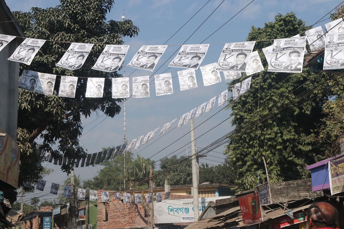 Electoral posters hanging over the road at Shibganj thana intersection in Bogura on 11 December. Photo: Soel Rana