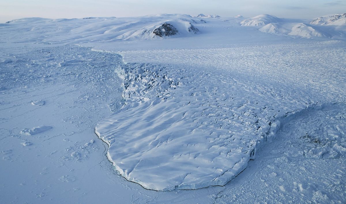 In this file photo taken on 30 March 2017 a glacier is seen from NASA`s Operation IceBridge research aircraft above Ellesmere Island, Canada, as the ice fields of Ellesmere Island are retreating due to warming temperatures. Photo: AFP