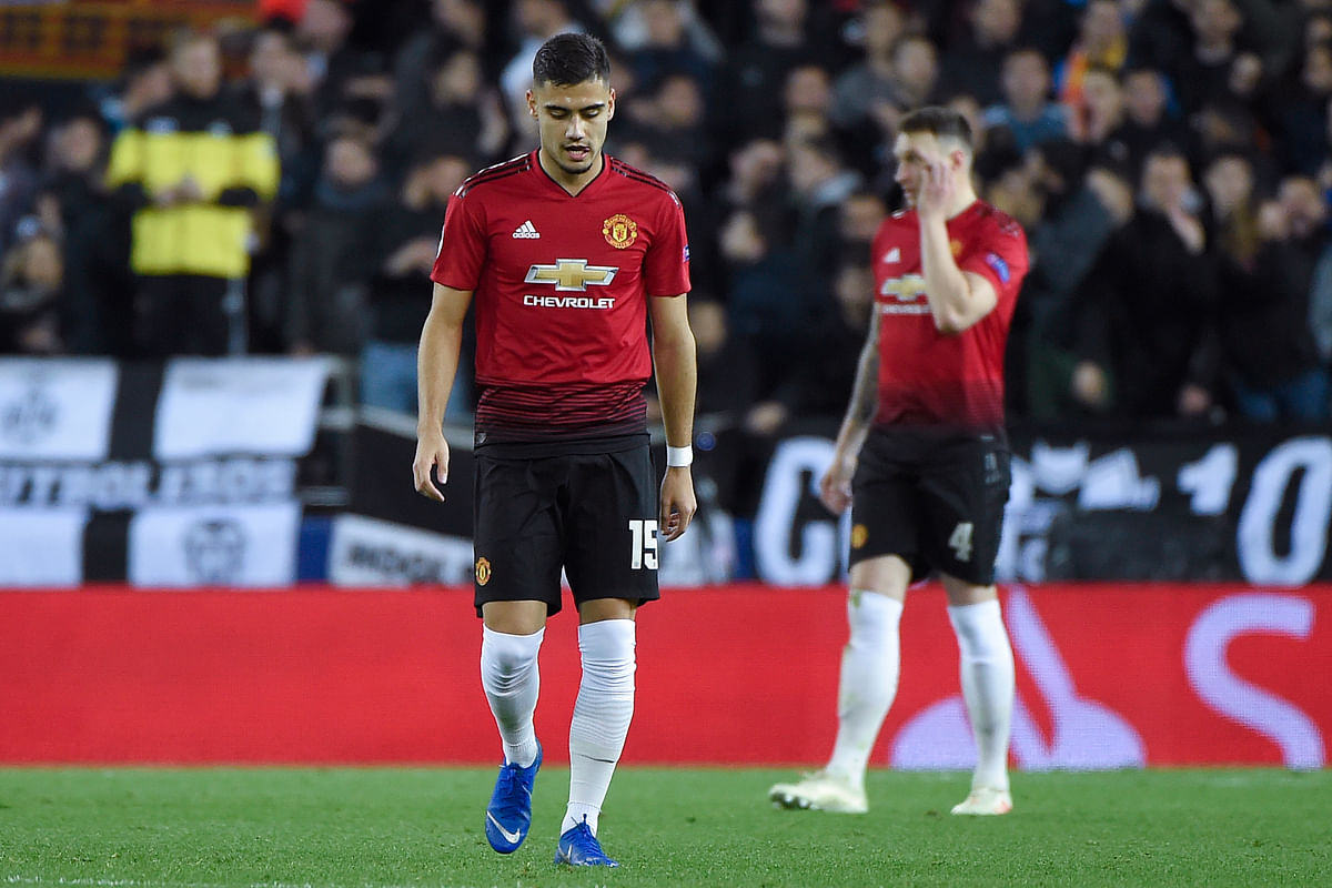 Manchester United`s Belgian-born Brazilian midfielder Andreas Pereira reacts after Valencia scored a goal during the UEFA Champions League group H football match between Valencia CF and Manchester United at the Mestalla stadium in Valencia on December 12, 2018. AFP
