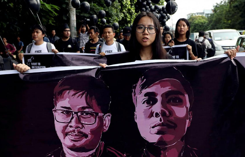 People march to show solidarity for jailed Reuters journalists Wa Lone and Kyaw Soe Oo two days before a local court is due to deliver verdict against them on charges of breaching the country`s Official Secrets Act in Yangon, Myanmar, on 1 September 2018. -- Photo: Reuters
