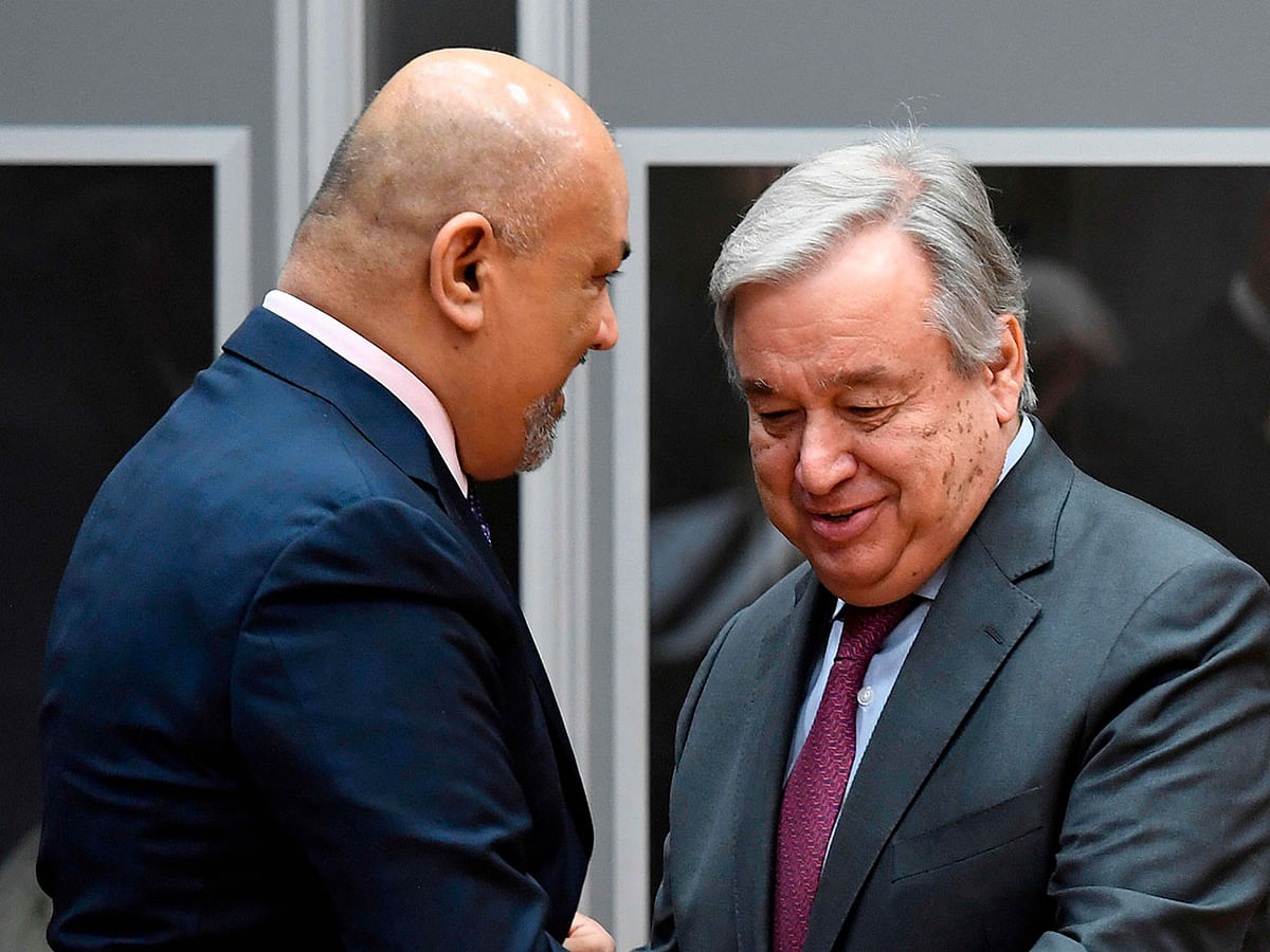 Yemen`s foreign minister Khaled al-Yamani (L) skakes hands with UN secretary general António Guterres as they attend the Yemen peace talks closing press conference at Johannesberg castle in Rimbo north of Stockholm on 13 December. Photo: AFP
