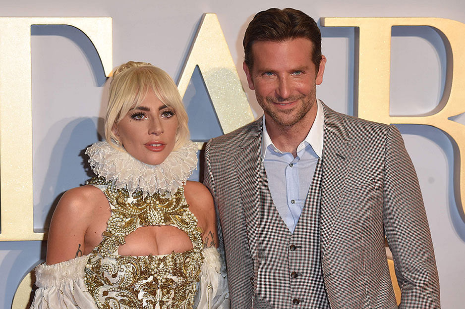 In this file photo taken on 27 September US singer and actress Lady Gaga (L) and US actor and filmmaker Bradley Cooper pose on the red carpet upon arrival for the UK premiere of the film `A Star is Born` in central London. Photo: AFP