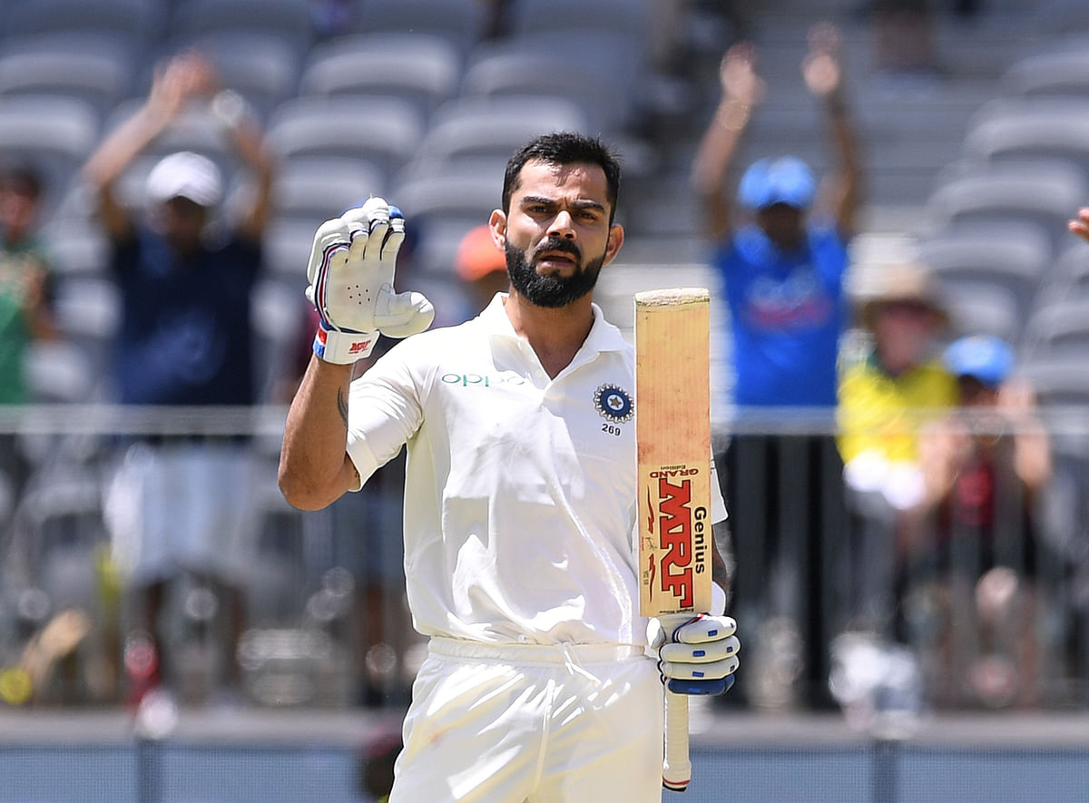 India`s captain Virat Kohli reacts after scoring his century on day three of the second test match between Australia and India at Perth Stadium in Perth, Australia, on 16 December 2018. Photo: Reuters
